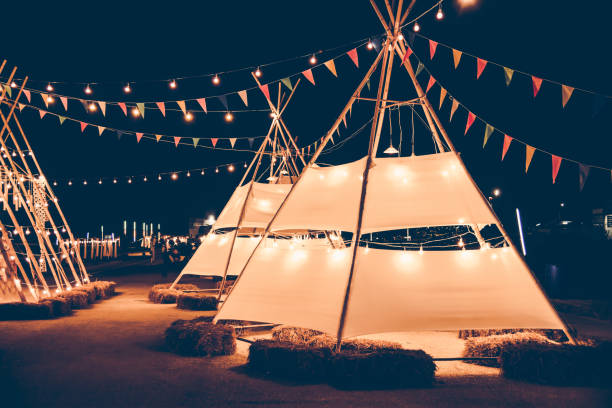 istock The marquee decorated with flags, decorated in a party during the night 1195977580