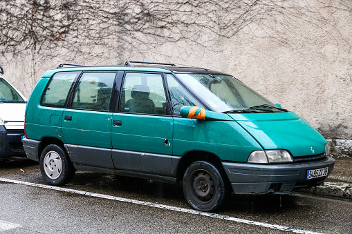 Grenoble, France - March 14, 2019: Green van Renault Espace in the city street.