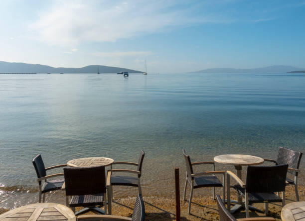 istock Chairs and tables in beach 1195978578