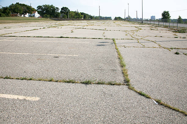 Abandoned employee parking lot stock photo