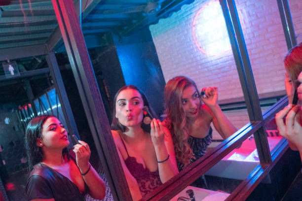 istock Girlfriends having fun sharing moments at the disco 1195980845
