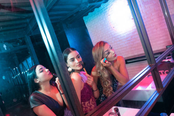 istock Girlfriends having fun sharing moments at the disco 1195980922