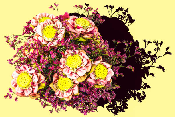 istock Lotus with red flowers isolated on yellow background, Pattern backgrounds 1195987448