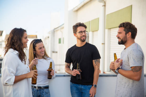 istock Best friends drinking beer and enjoying discussion 1195991625