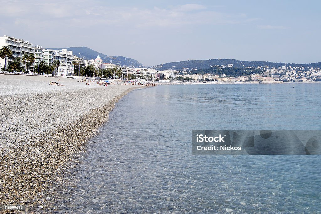 Shingle spiaggia a Nizza. Provenza. La Francia - Foto stock royalty-free di Baia degli Angeli