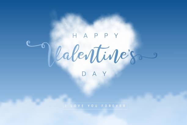 istock heart shaped clouds in the blue sky. Love and valentine concept. 1195997709