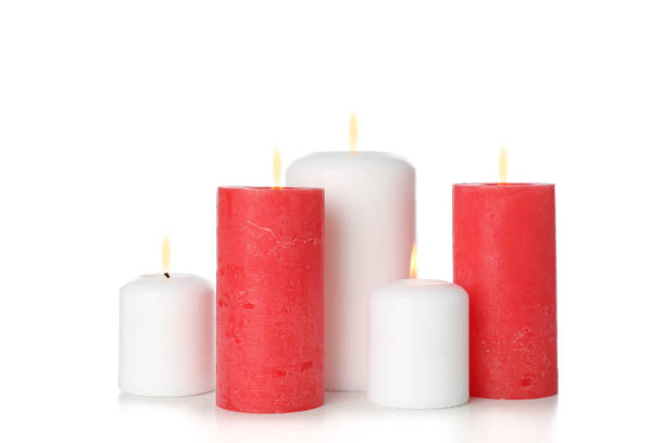 istock Group of different candles isolated on white background 1195997903
