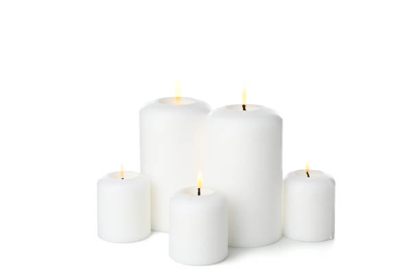 istock Group of different candles isolated on white background 1195998066
