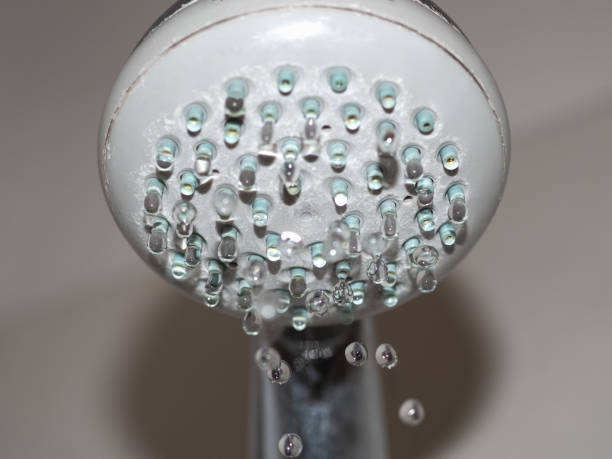 istock drops of water from shower head 1195998951