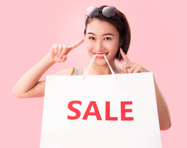 istock Young women shopping 1196002041