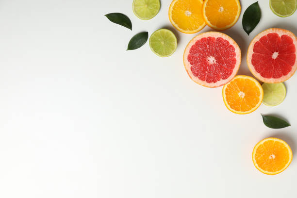 istock Flat lay with exotic fruits on white background, space for text 1196002655
