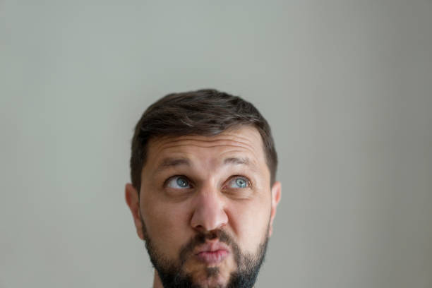 istock Thoughtful young man, close up 1196002860