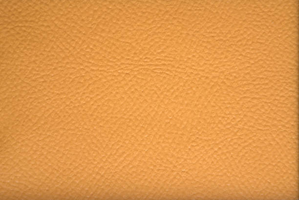 istock Genuine leather beige. Background. Texture. Close up shot. 1196003637