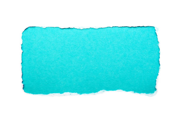 istock A hole in white paper with torn edges isolated on a white background with a light blue color paper background inside. Good paper texture 1196006550