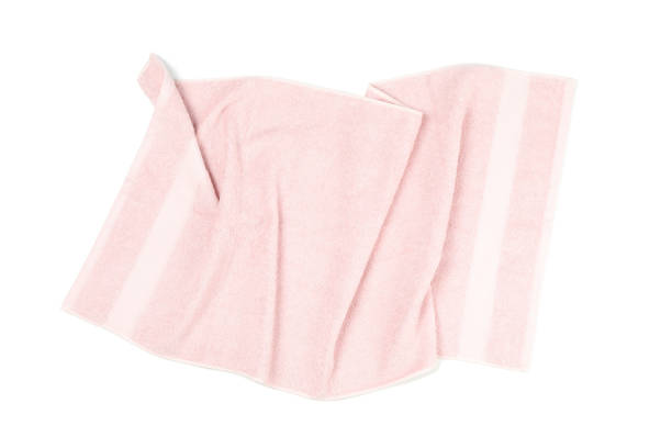istock Crumpled pink towel isolated on white background 1196007552