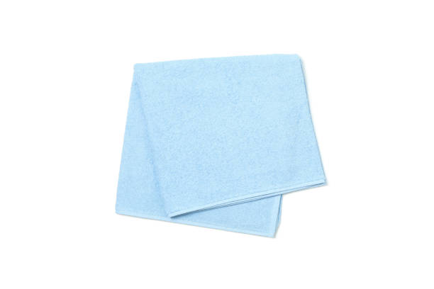 istock Blue towel isolated on white background, top view 1196007559