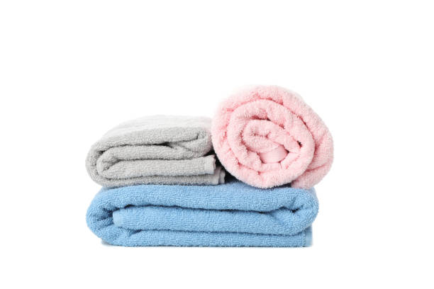 istock Folded color towels isolated on white background, close up 1196007595