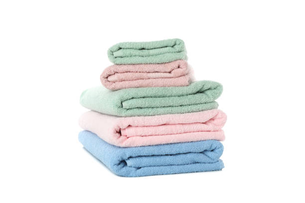 istock Stack of colored towels isolated on white background 1196007716