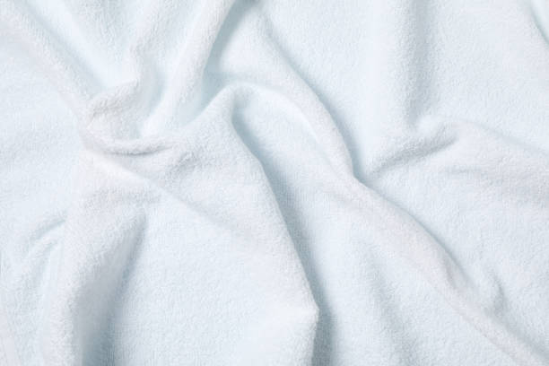 istock White crumpled towel textured background, close up 1196008485
