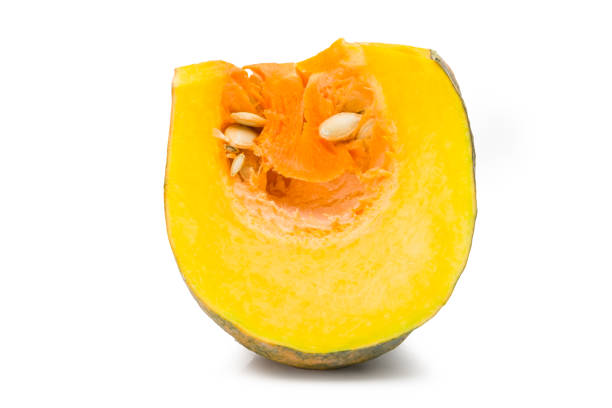 istock Asian pumpkin species cut in half on a white background with clipping path. 1196009462