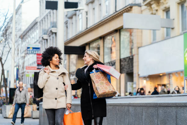 istock Girls at shopping 1196011035