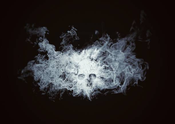 istock Abstract skull wrapped in smoke floating in the dark 1196012588