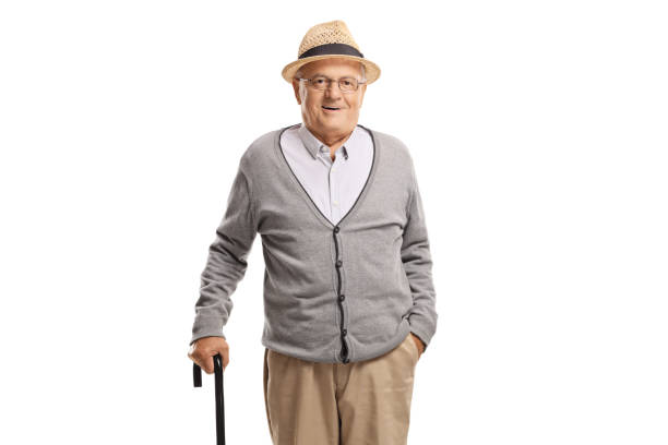 istock Elderly man standing with a cane 1196014808