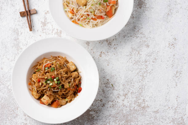 istock Asia noodle with vegetable food background 1196016510