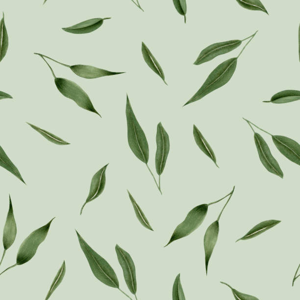 istock Seamless floral pattern with watercolor green leaves, hand drawn isolated on a grey background 1196017357
