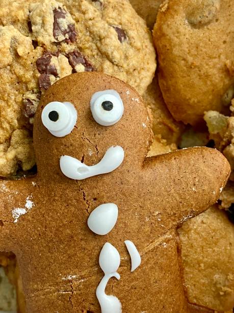 istock Holiday cookies featuring gingerbread man cookie on top. 1196020003