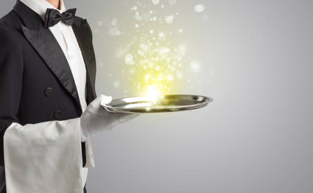 istock Waiter serving mysterious light on tray 1196023013