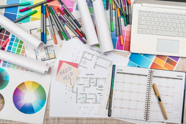 istock Top view of architectural blueprints  with material sample on creative desk 1196023168