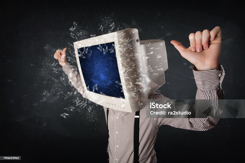 Computer Monitor Screen Exploding On A Young Persons Head Stock Photo ...