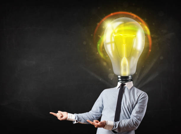 istock Business man with light bulb head concept 1196024997