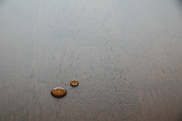 istock Water droplets on a wooden table 119603013