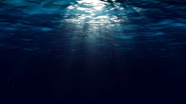 Photo of Abstract underwater background with sunbeams