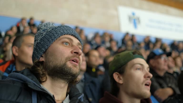 Male scream win goal game hockey fan closeup expressive happy shouting crowd 4K.