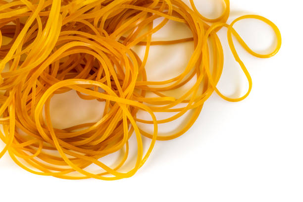 istock Rubber bands close-up, isolated on white. Office supply. 1196035534