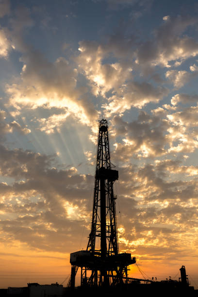istock Fracking oil rig in the morning 1196036956