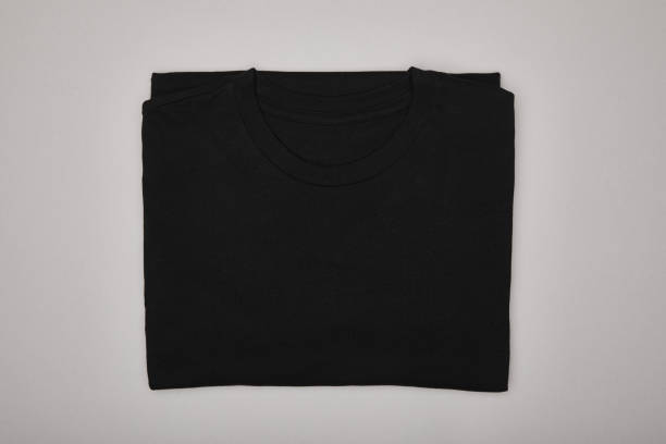 istock top view of blank basic black t-shirt isolated on grey 1196037001