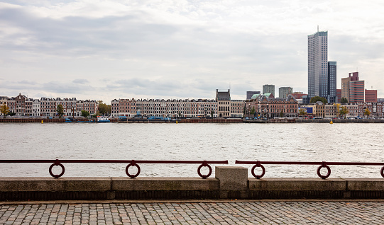 Rotterdam, Netherlands skyline river port in a cloudy autumn day