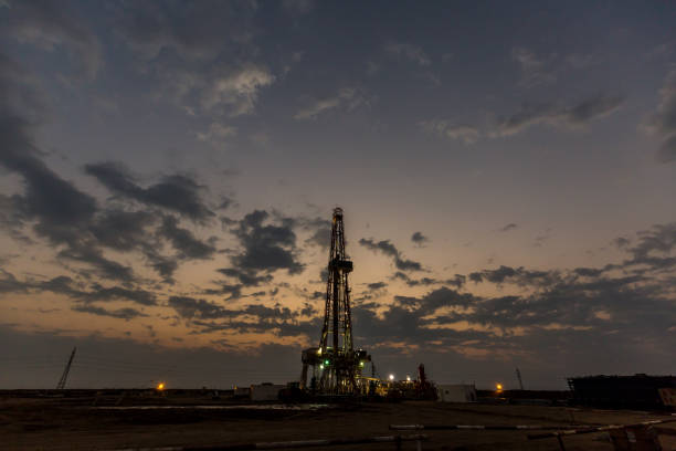 istock Fracking oil rig in the morning 1196043014