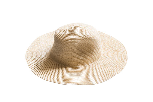Yellow straw wide brimmed hat isolated over white
