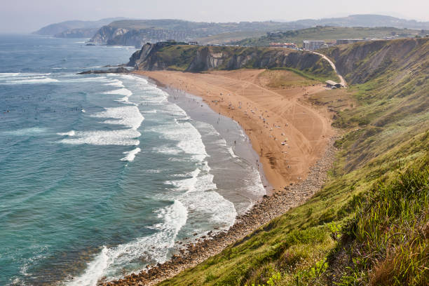 La Salvaje beach viewed from above. Basque country, Spain Spanish sandy coastline with surfers. Sopelana, Basque country, Spain sopelana stock pictures, royalty-free photos & images