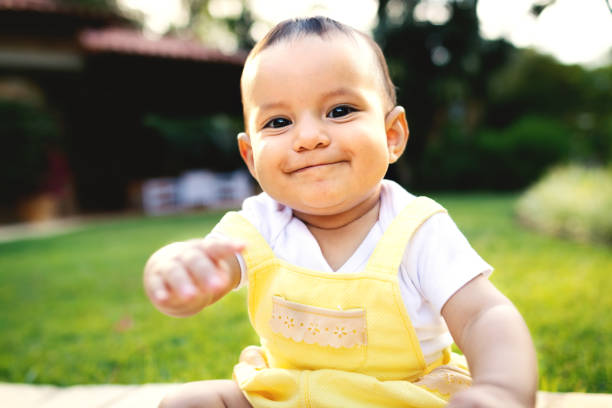 istock Cute baby girl, playing in the backyard 1196047543