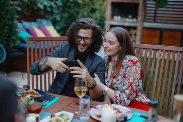 istock Beautiful young couple taking selfie 1196049569