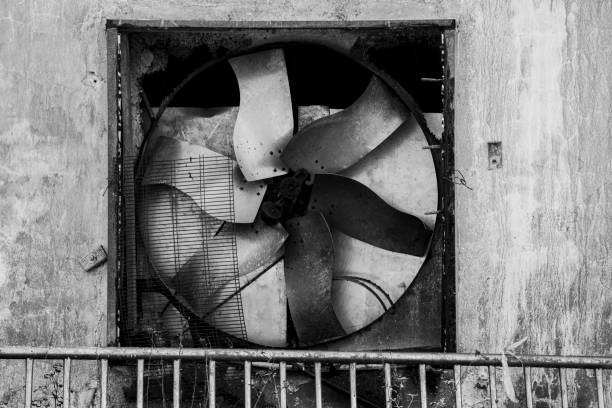 old industrial fan stopped and abandoned sign of an impending decline