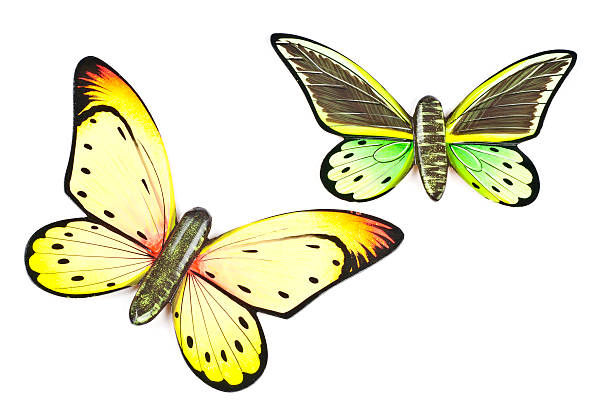 istock Wooden Butterflies Isolated on White 119605035