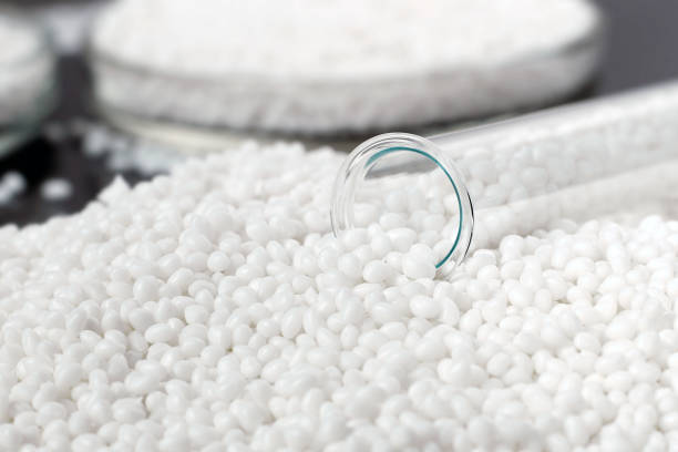 istock Closeup of a white plastic polymer in granules 1196051205