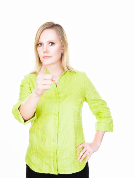 Young woman pointing her finger stock photo